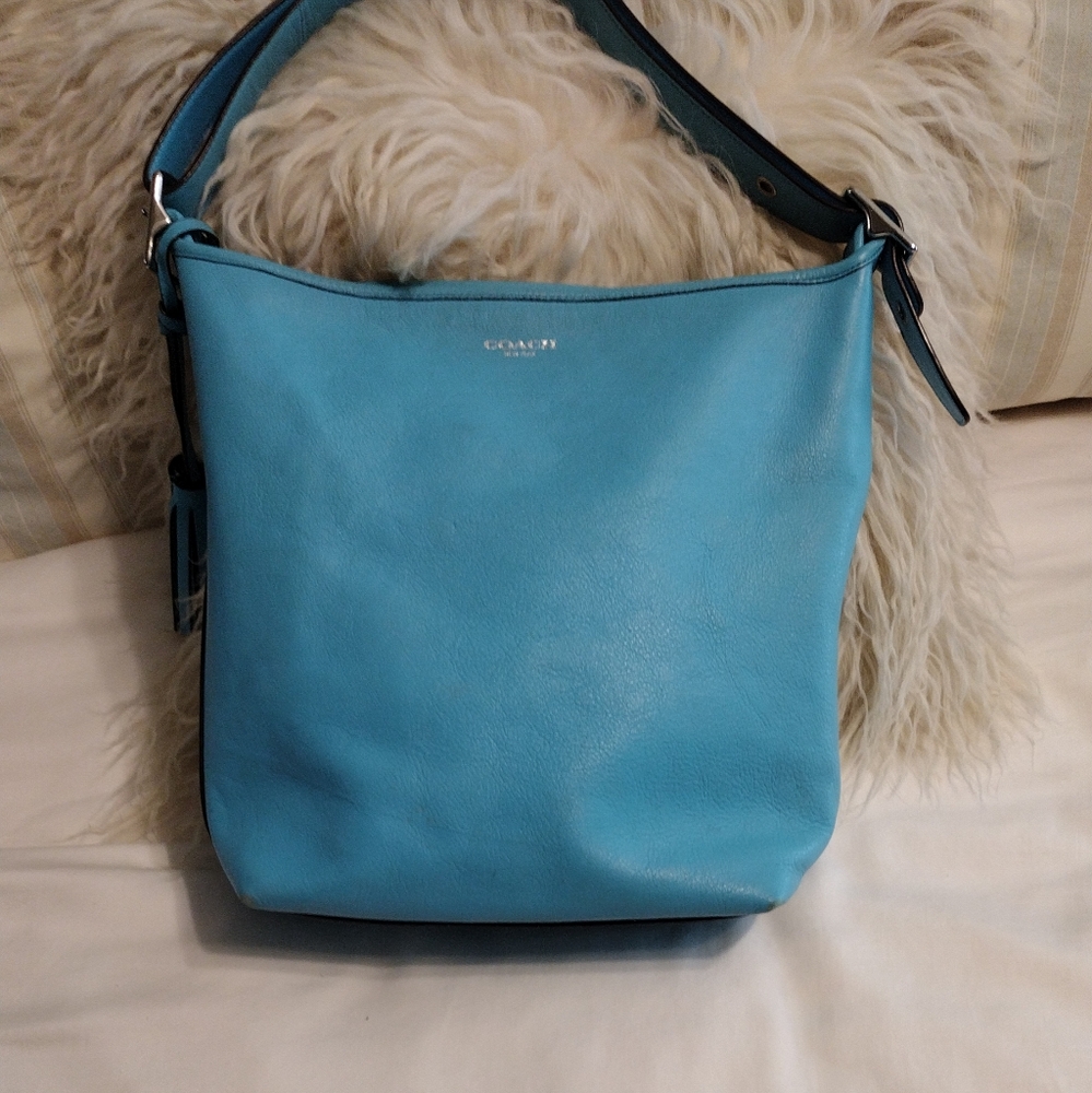 Coach legacy bag with tassels. Turquoise leather with silver. Hobo/bucket bag.
